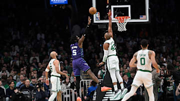 Apr 11, 2025; Boston, Massachusetts, USA; Charlotte Hornets center Mark Williams (5) shoots the ball against Boston Celtics center Al Horford (42) during the first half at TD Garden. Mandatory Credit: Eric Canha-Imagn Images