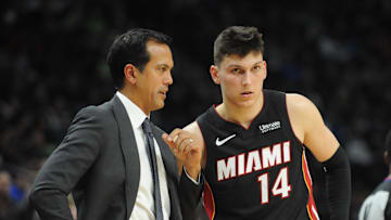 Oct 27, 2019; Minneapolis, MN, USA; Miami Heat head coach Erik Spoelstra talks with guard Tyler Herro in the third quarter against the Minnesota Timberwolves at Target Center. Mandatory Credit: Marilyn Indahl-Imagn Images