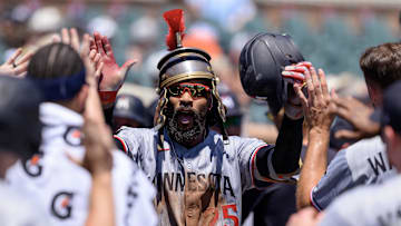 Jun 28, 2025; Detroit, Michigan, USA;  Minnesota Twins designated hitter Byron Buxton (25) celebrates in the dugout after hitting a two-run home run against the Detroit Tigers in the third inning at Comerica Park. Mandatory Credit: Lon Horwedel-Imagn Images