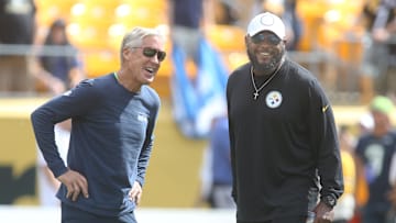 Sep 15, 2019; Pittsburgh, PA, USA; Seattle Seahawks head coach Pete Carroll (left) and Pittsburgh Steelers head coach Mike Tomlin (right) share a laugh before a game at Heinz Field. Mandatory Credit: Charles LeClaire-Imagn Images
