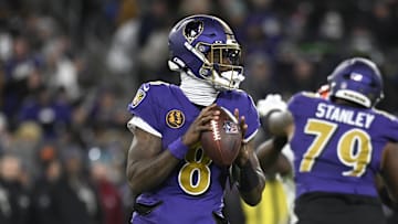 Nov 27, 2025; Baltimore, Maryland, USA; Baltimore Ravens quarterback Lamar Jackson (8) drops back to pass against the Cincinnati Bengals during the first half at M&T Bank Stadium. Mandatory Credit: Tommy Gilligan-Imagn Images