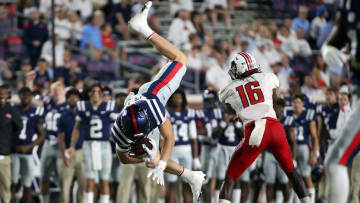 Sep 11, 2021; Oxford, Mississippi, USA; Mississippi Rebels tight end Jonathan Hess is flipped in the air by Austin Peay Governors defensive back Shamari Simmons (16) during the forth quarter at Vaught-Hemingway Stadium. Mandatory Credit: Petre Thomas-USA TODAY Sports