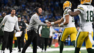 Dec 5, 2024; Detroit, Michigan, USA;  Green Bay Packers head coach Matt LeFleur celebrates withGreen Bay Packers quarterback Jordan Love (10) after Love threw a touchdown pass to tight end Tucker Kraft (not pictured)  against the Detroit Lions in the third quarter at Ford Field. Mandatory Credit: Lon Horwedel-Imagn Images