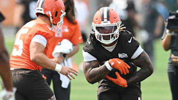 Cleveland Browns running back Quinshon Judkins (10) runs with the ball during mini camp at CrossCountry Mortgage Campus