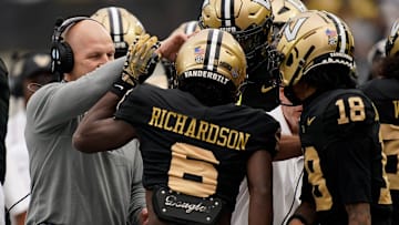 Vanderbilt coach Clark Lea congratulates wide receiver Tre Richardson (6) on his touchdown against Kentucky during the second quarter at FirstBank Stadium in Nashville, Tenn., Saturday, Nov. 22, 2025.