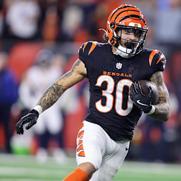Dec 28, 2024; Cincinnati, Ohio, USA;  Cincinnati Bengals running back Chase Brown (30) runs the ball during the fourth quarter against the Denver Broncos at Paycor Stadium. Mandatory Credit: Joseph Maiorana-Imagn Images