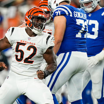 Cincinnati Bengals defensive end Cedric Johnson (52) celebrates taking down Indianapolis Colts quarterback Sam Ehlinger (4) in the second quarter of the NFL preseason game at Paycor Stadium in Cincinnati on Thursday, Aug. 22, 2024.