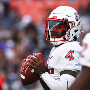 New Mexico Lobos transfer quarterback Devon Dampier (4) was named the Big 12 Newcomer of the Year ahead of the 2025-26 season