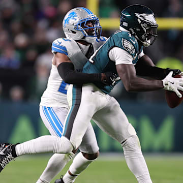 Nov 16, 2025; Philadelphia, Pennsylvania, USA; Philadelphia Eagles wide receiver A.J. Brown (11) makes a catch against Detroit Lions cornerback Rock Ya-Sin (23) during the second half at Lincoln Financial Field. Mandatory Credit: Bill Streicher-Imagn Images