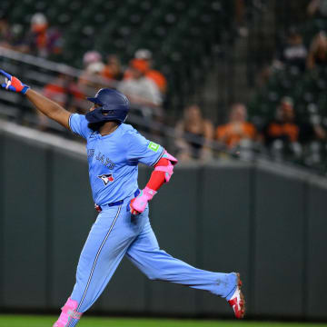 Toronto Blue Jays first baseman Vladimir Guerrero Jr. (27) hits a home run during the eighth inning against the Baltimore Orioles at Oriole Park at Camden Yards on July 29.