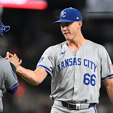 Kansas City Royals pitcher James McArthur (66) celebrates with catcher Freddy Fermin (34) after defeating the Detroit Tigers at Comerica Park on Aug 2.