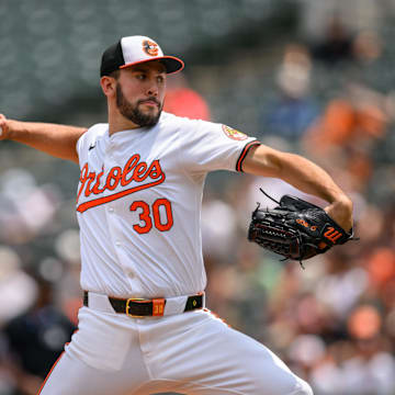Jul 31, 2024; Baltimore, Maryland, USA; Baltimore Orioles pitcher Grayson Rodriguez (30) throws against the Toronto Blue Jays during the first inning at Oriole Park at Camden Yards. Mandatory Credit: Reggie Hildred-Imagn Images