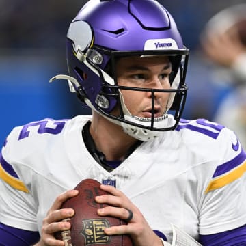 Jan 7, 2024; Detroit, Michigan, USA; Minnesota Vikings quarterback Nick Mullens (12) warms up prior to their game against the Detroit Lions at Ford Field. Mandatory Credit: Lon Horwedel-USA TODAY Sports