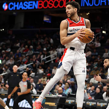 Mar 27, 2025; Washington, District of Columbia, USA; Washington Wizards guard Colby Jones (1) grabs a rebound during the second half against the Indiana Pacers at Capital One Arena. Mandatory Credit: Daniel Kucin Jr.-Imagn Images