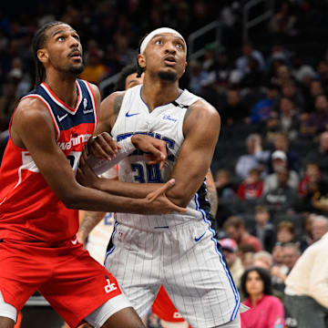 Mar 21, 2025; Washington, District of Columbia, USA; Washington Wizards forward Alex Sarr (20) and Orlando Magic center Wendell Carter Jr. (34) battle for position during the third quarter at Capital One Arena. Mandatory Credit: Reggie Hildred-Imagn Images