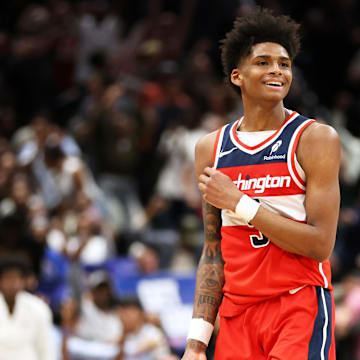 lMar 29, 2025; Washington, District of Columbia, USA; Washington Wizards guard AJ Johnson (5) celebrates during the second half against the Brooklyn Nets at Capital One Arena. Mandatory Credit: Daniel Kucin Jr.-Imagn Images