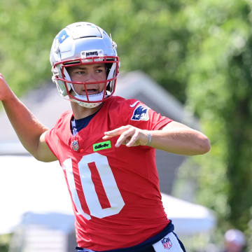 Jul 26, 2024; Foxborough, MA, USA; New England Patriots quarterback Drake Maye (10) throws a pass during training camp at Gillette Stadium. Mandatory Credit: Eric Canha-USA TODAY Sports