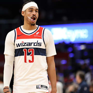 Mar 27, 2025; Washington, District of Columbia, USA; Washington Wizards guard Jordan Poole (13) looks on during the first half against the Indiana Pacers at Capital One Arena. Mandatory Credit: Daniel Kucin Jr.-Imagn Images