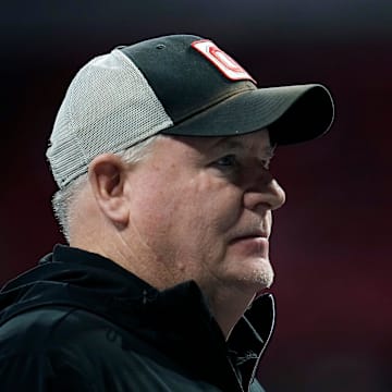 Ohio State offensive coordinator Chip Kelly watches warm ups before the start of the College Football Playoff National Championship at Mercedes-Benz Stadium in Atlanta on January 20, 2025.