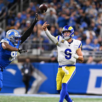 Sep 8, 2024; Detroit, Michigan, USA; Los Angeles Rams quarterback Matthew Stafford (9) throws a pass against the Detroit Lions in the second quarter at Ford Field. Mandatory Credit: Lon Horwedel-Imagn Images