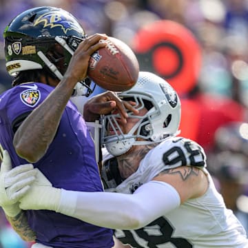 Las Vegas Raiders defensive end Maxx Crosby (98) sacks Baltimore Ravens quarterback Lamar Jackson (8) during the second half at M&T Bank Stadium. 