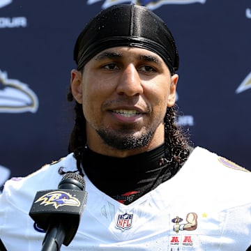 Jun 11, 2025; Baltimore, MD, USA; Baltimore Ravens linebacker Tavius Robinson (95) speaks after an NFL OTA at Under Armour Performance Center. Mandatory Credit: Daniel Kucin Jr.-Imagn Images