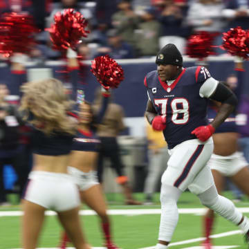 Jan 13, 2024; Houston, Texas, USA; Houston Texans offensive tackle Laremy Tunsil (78) is introduced before playing against the Cleveland Browns in a 2024 AFC wild card game at NRG Stadium. Mandatory Credit: Thomas Shea-USA TODAY Sports