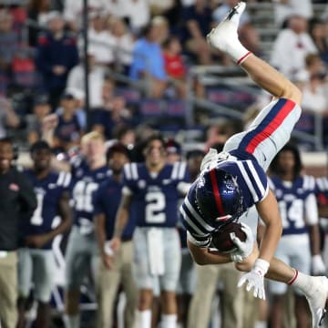 Sep 11, 2021; Oxford, Mississippi, USA; Mississippi Rebels tight end Jonathan Hess is flipped in the air by Austin Peay Governors defensive back Shamari Simmons (16) during the forth quarter at Vaught-Hemingway Stadium. Mandatory Credit: Petre Thomas-USA TODAY Sports