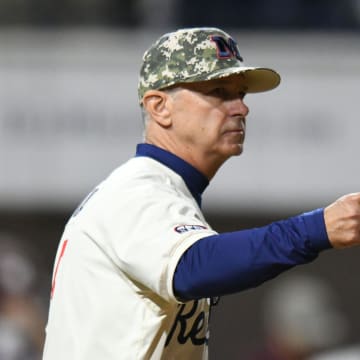 Ole Miss head coach Mike Bianco (5) makes a pitching change against Mississippi State at Swayze Field in Oxford, Miss., on Friday, Apr. 12, 2024.