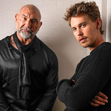 Dave Bautista, left, plays the evil Glossu Rabban Harkonnen and Austin Butler plays his equally evil brother Feyd-Rautha Harkonnen in \"Dune: Part Two.   