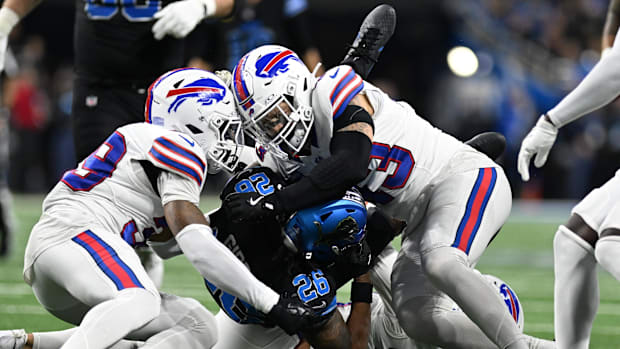 Dec 15, 2024; Detroit, Michigan, USA; Detroit Lions running back Jahmyr Gibbs (26) gets tackled by Buffalo Bills cornerback C