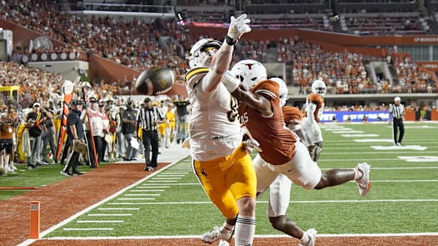 Sep 16, 2023; Austin, Texas, USA; Texas Longhorns defensive back Jalen Catalon (11) breaks up a pass intended for Wyoming Cow