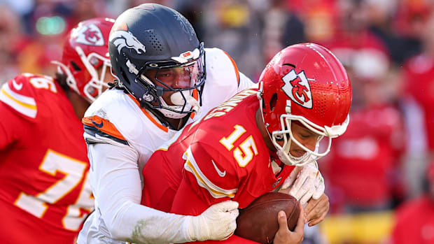 Denver Broncos OLB Nik Bonitto (15) sacks Kansas City Chiefs quarterback Patrick Mahomes (15). 