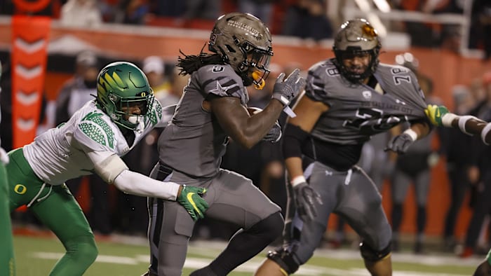 Nov 20, 2021; Salt Lake City, Utah, USA; Utah Utes running back Chris Curry (0) runs the ball
