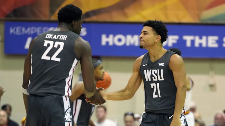 Ace Glass (21) and ND Okafor (22)