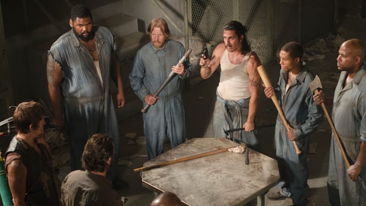 (Clock wise from the bottom) T-Dog (Robert 'IronE' Singleton), Rick Grimes (Andrew Lincoln), Daryl Dixon (Norman Reedus), Big Tiny (Theodus Crane), Axel (Lew Temple), Tomas (Nick Gomez), Andrew (Markice Moore) and Oscar (Vincent Ward) - The Walking Dead - Season 3, Episode 2 - Photo Credit: Gene Page/AMC