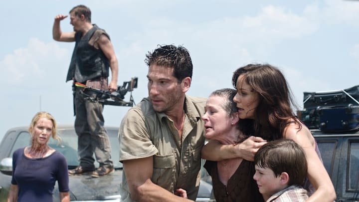 (L-R) Andrea (Laurie Holden), Daryl Dixon (Norman Reedus), Shane Walsh (Jon Bernthal), Carol (Melissa Suzanne McBride), Lori Grimes (Sarah Wayne Callies), and Carl Grimes (Chandler Riggs) in The Walking Dead season 2