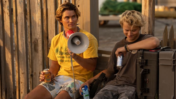 Outer Banks. (L to R) Chase Stokes as John B, Rudy Pankow as JJ in episode 307 of Outer Banks. Cr. Jackson Lee Davis/Netflix © 2023