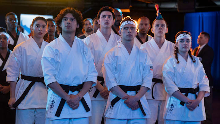 Cobra Kai. (L to R) Oona O’Brien as Devon, Xolo Maridueña as Miguel Diaz, Gianni DeCenzo as Demetri, Jacob Bertrand as Eli 'Hawk' Moskowitz, Mary Mouser as Samantha LaRusso in Cobra Kai. Cr. Curtis Bonds Baker/Netflix © 2024