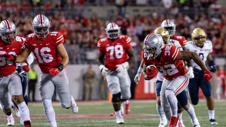 Ohio State Buckeyes running back TreVeyon Henderson (32) runs the ball during the game against the Akron Zips at Ohio Stadium in Columbus, Ohio Sept. 25. Ohio State would win the game 59-7

Osu21akr Njg 011