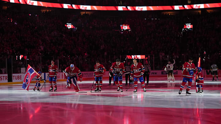 Jan 27, 2026; Montreal, Quebec, CAN; Montreal Canadiens players during the National Anthem before the game against the Vegas Golden Knights at the Bell Centre. Mandatory Credit: Eric Bolte-Imagn Images