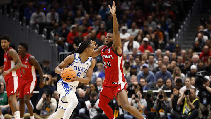 Mar 27, 2026; Washington, DC, USA; Duke Blue Devils forward Maliq Brown (6) dribbles the ball against St. John's Red Storm forward Zuby Ejiofor (24) in the first half during a Sweet Sixteen game of the East Regional of the men's 2026 NCAA Tournament at Capital One Arena. Mandatory Credit: Geoff Burke-Imagn Images
