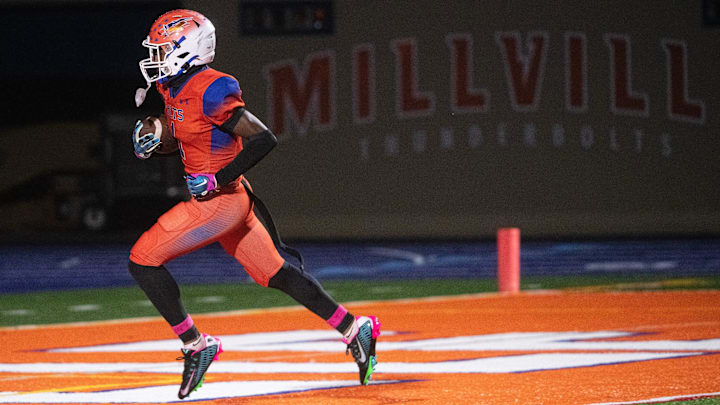 Millville's Lotzeir Brooks carries the ball in for a touchdown during the South Jersey Group 4 championship football game between Millville and Mainland played in Millville on Friday, November 10, 2023.