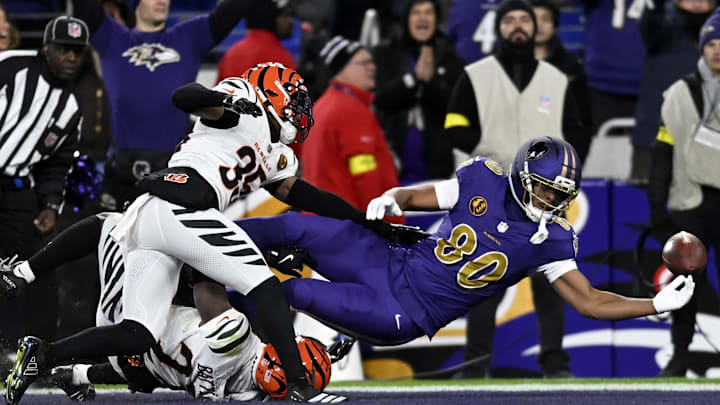 Nov 27, 2025; Baltimore, Maryland, USA; Baltimore Ravens tight end Isaiah Likely (80) attempts to make a catch against the Cincinnati Bengals during the first half at M&T Bank Stadium. Mandatory Credit: Tommy Gilligan-Imagn Images