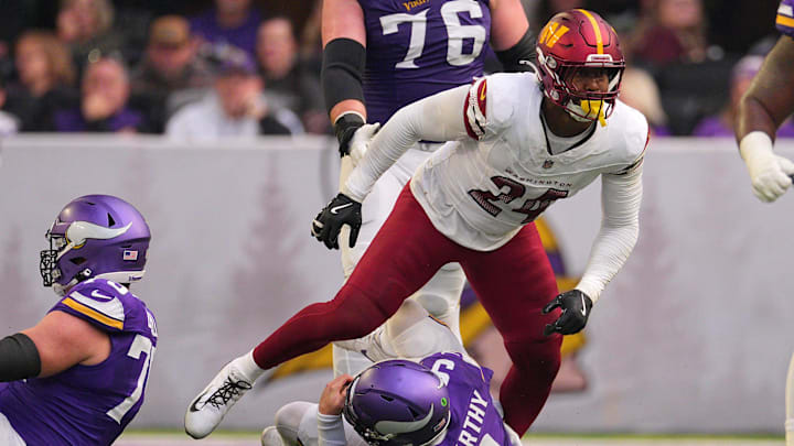 Dec 7, 2025; Minneapolis, Minnesota, USA; Washington Commanders outside linebacker Von Miller (24) sacks Minnesota Vikings quarterback J.J. McCarthy (9) during the first half at U.S. Bank Stadium. Mandatory Credit: Brad Rempel-Imagn Images