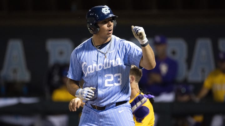 Jun 2, 2024; Chapel Hill, NC, USA; North Carolina Tar Heels designated hitter Alberto Osuna (23) reacts to earning a walk against the Louisiana State Tigers  in the ninth inning of the Div. I NCAA baseball regional at Boshamer Stadium.  Mandatory Credit: Jeffrey Camarati-USA TODAY Sports
