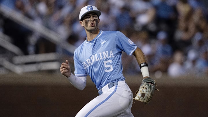 Jun 8, 2024; Chapel Hill, NC, USA; North Carolina Tar Heels Gavin Gallaher (5) reacts to making an out against the West Virginia Mountaineers in the fifth inning of the DI Baseball Super Regional at Boshamer Stadium. Mandatory Credit: Jeffrey Camarati-Imagn Images

