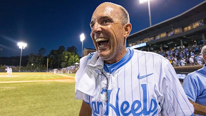 Jun 7, 2024; Chapel Hill, NC, USA; North Carolina Tar Heels Head Coach Scott Forbes (31) celebrates his team’s win over the West Virginia Mountaineers in the DI Baseball Super Regional at Boshamer Stadium.  Mandatory Credit: Jeffrey Camarati-Imagn Images
