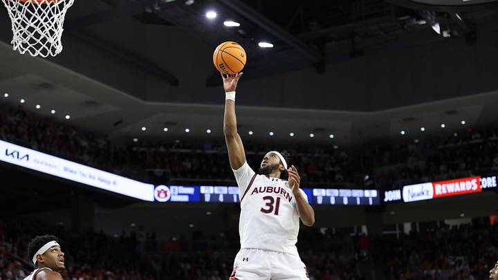 Jan 14, 2025; Auburn, Alabama, USA;  Auburn Tigers forward Chaney Johnson (31) takes an open shot against the Mississippi State Bulldogs during the second half at Neville Arena. Mandatory Credit: John Reed-Imagn Images