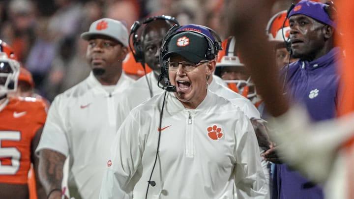 Nov 8, 2025; Clemson, South Carolina, USA; Clemson Tigers defensive coordinator Tom Allen communicates with players in the game against the Florida State Seminoles during the second quarter at Memorial Stadium. Mandatory Credit: Ken Ruinard - GREENVILLE NEWS-USA TODAY Network via Imagn Images